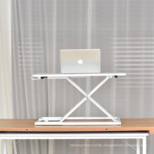 Sit-stand mini laptop desk on bed adjustable.
